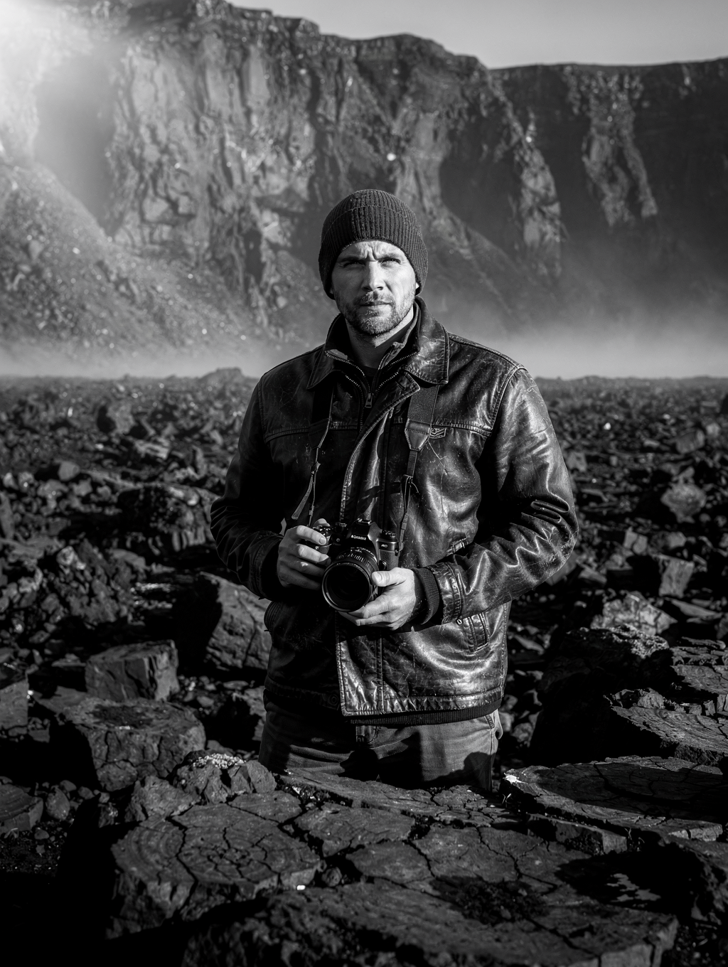 Photographer documenting landscape in remote wilderness